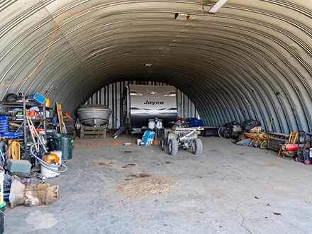 Shamrock Ranch Equipment Auction - Barn with equipment